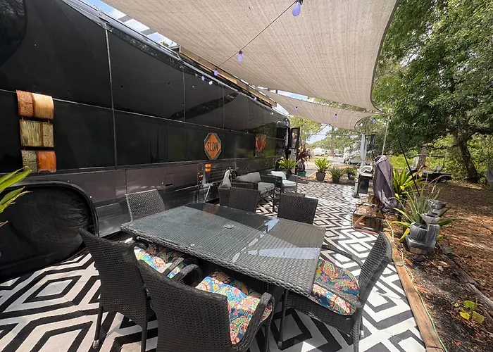 Sleek, Modern, Pet Friendly Custom Tour Bus!