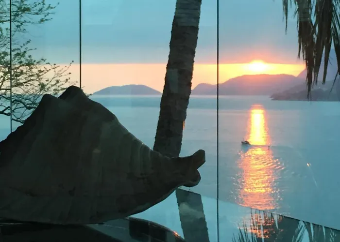 Aluguéis de temporada: Suites na Casa da Praia